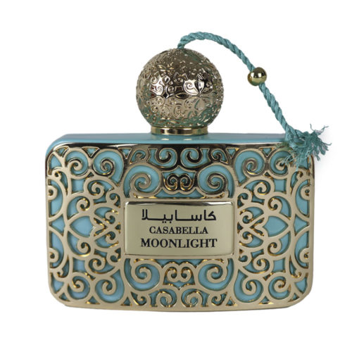 Close-up of the Casabella Moonlight Eau de Parfum bottle by Le Chameau, adorned with intricate gold detailing and a light blue tassel.