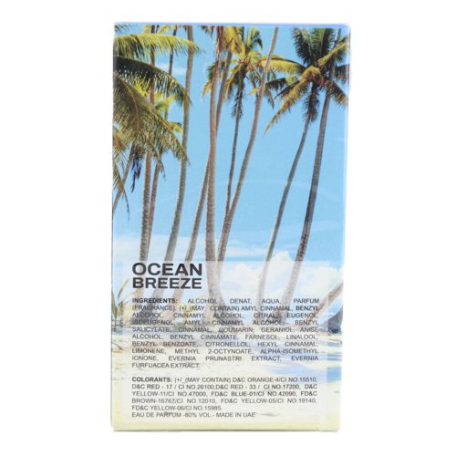 Back view of Ocean Breeze Eau de Parfum by Milestone, showing the ingredient list on a box with a tropical beach and palm tree design