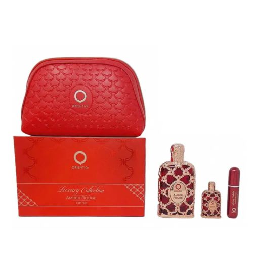 Orientica Amber Rouge Luxury Collection gift set with a red cosmetic bag, full-size perfume bottle, mini bottle, and travel spray, all presented on a decorative box.