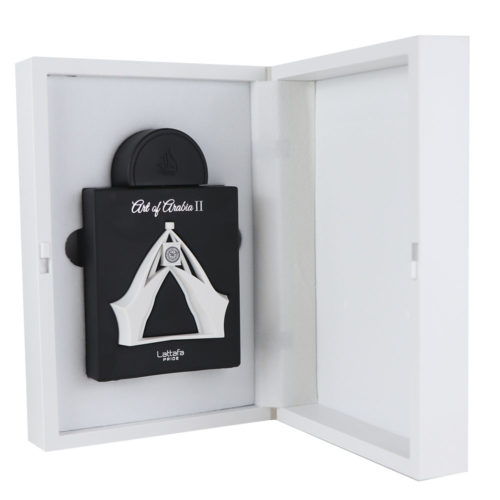 Open box view of Lattafa Pride Art of Arabia II Eau De Parfum, showing the black bottle with white detailing inside a white case.