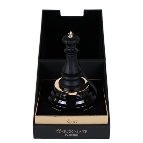 The Checkmate King Eau de Parfum bottle inside its packaging, shaped like a black chess king with gold accents.