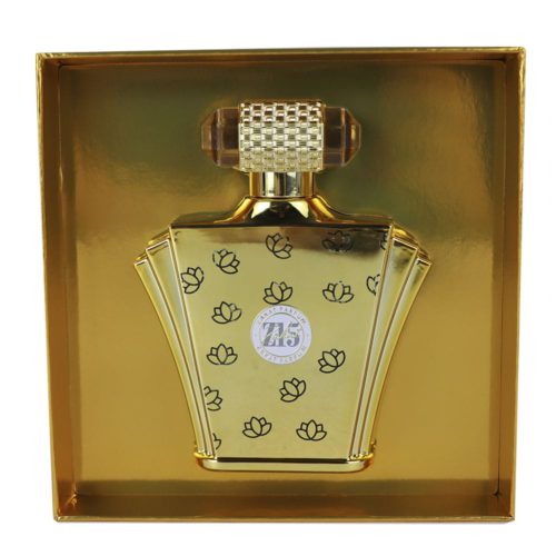 Open box of Zakat Parfum Z17, showing the gold perfume bottle inside a luxurious golden interior.