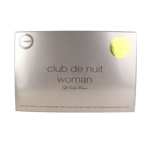 A silver gift box for "Club de Nuit Woman" by Armaf. The box has a minimalist design with the product name in black text and a yellow circle accent on the top right. The packaging mentions the set includes Eau de Parfum (100ml), Body Lotion (100ml), Body Spray (50ml), and Fragrance Body Mist (250ml).