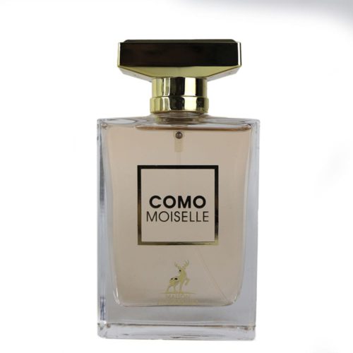 A close-up of the "Como Moiselle" perfume bottle by Maison Alhambra. The transparent bottle has a golden cap and a minimalist label with black and gold accents.