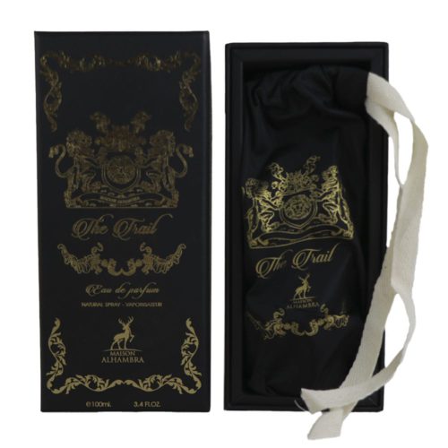 The "The Trail" perfume box and pouch, both black with gold detailing, showcasing a luxurious presentation.