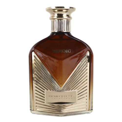 A luxurious bottle of Victorioso Heroic Eau de Parfum by Maison Alhambra. The glass bottle has a brown-to-gold gradient design with gold detailing and the words "Victorioso Heroic" engraved.