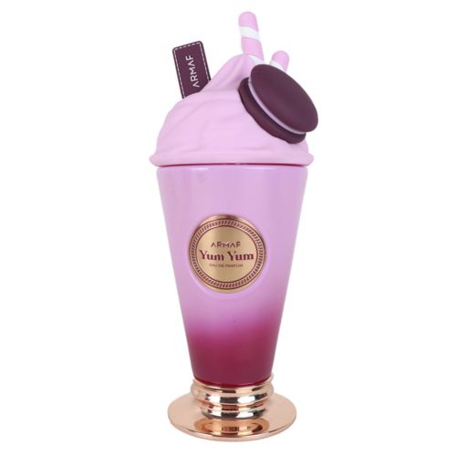 Close-up of the Armaf Yum Yum perfume bottle, designed to resemble a milkshake with a frosted pink top and decorative straws.
