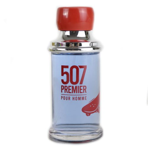 Close-up of the 507 Premier Pour Homme perfume bottle with a red cap and skateboard-themed design.