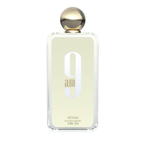 Close-up of a transparent perfume bottle of "9AM Eau de Parfum" by Afnan, featuring a gold spherical cap and a minimalist beige label.