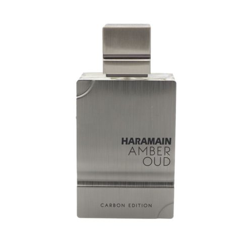 Close-up of the Haramain Amber Oud Carbon Edition bottle with brushed metal finish and bold branding.