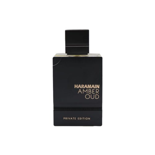 Close-up of the Amber Oud Private Edition perfume bottle with minimalist black-and-gold design.