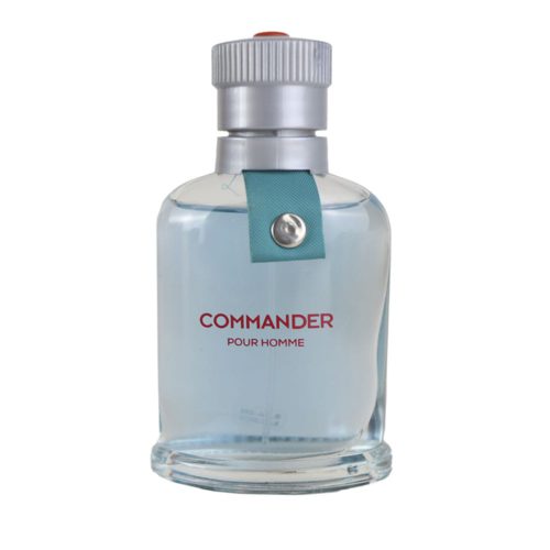 Close-up of the Commander Pour Homme perfume bottle with a light blue liquid and silver cap.
