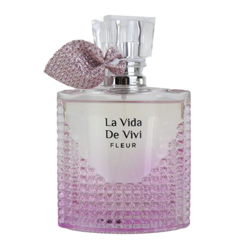 Close-up of the "La Vida De Vivi Fleur" Eau de Parfum bottle with a textured pink glass and decorative bow.