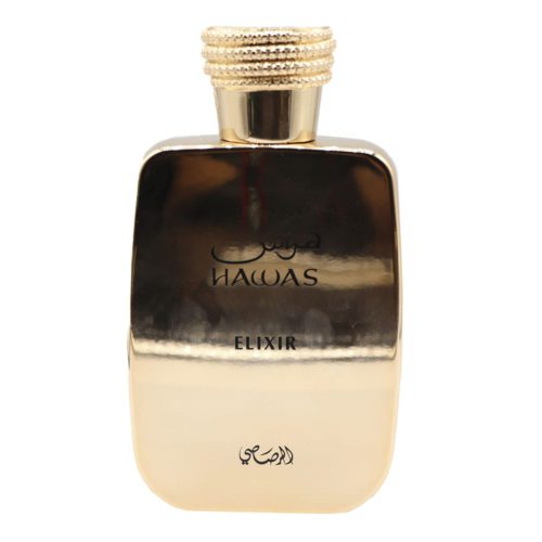 Close-up of the Hawas Elixir perfume bottle in shiny gold with Arabic calligraphy and ribbed cap.