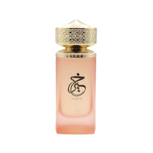 Close-up of Khair Fusion perfume bottle with gold cap and elegant Arabic calligraphy.