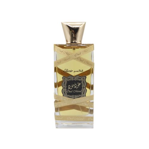 Close-up of the Oud Mood Elixir perfume bottle by Lattafa, featuring a golden liquid and decorative golden ribbons wrapped around the bottle.