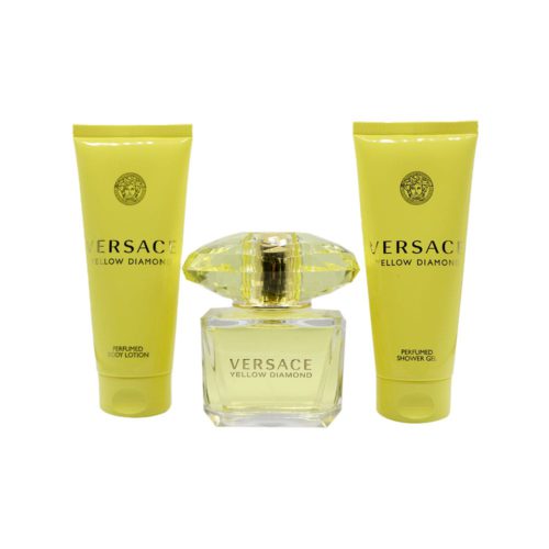 Versace Yellow Diamond fragrance set including a perfume bottle centered between a body lotion and a shower gel.