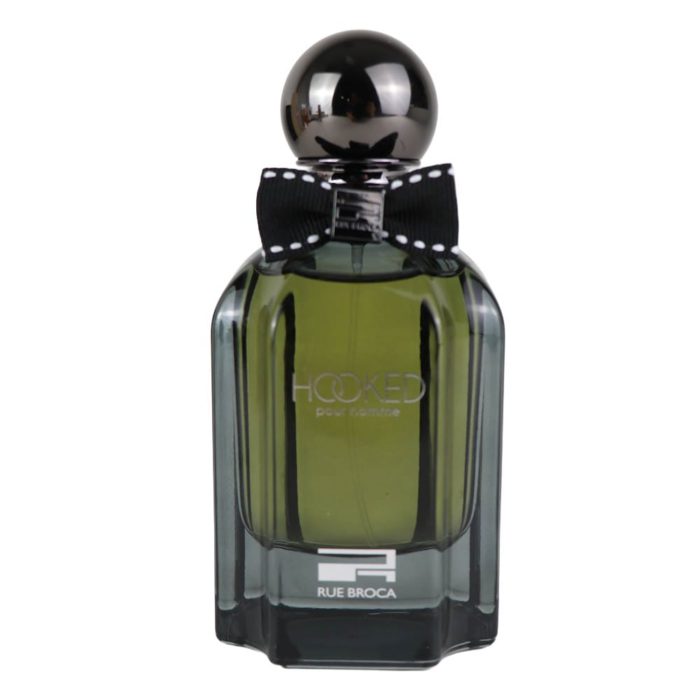Rue Broca Hooked EDP 100 ml perfume bottle close-up with green liquid, black bow tie, and shiny spherical cap.
