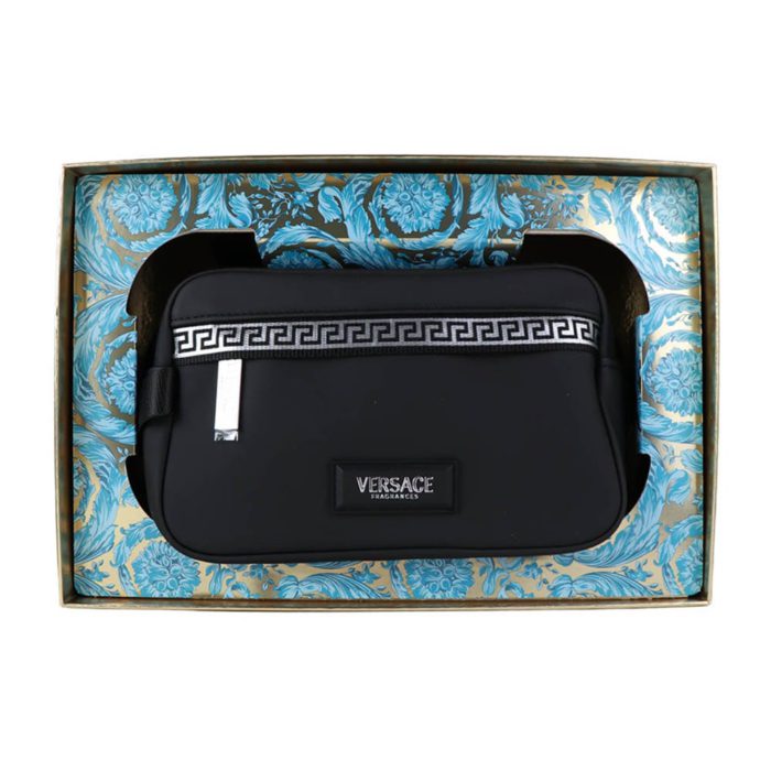 Open Versace Eros Gift Set displaying black toiletry bag against decorative box interior.